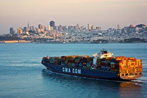 The image is a photograph of a cargo ship transporting goods.